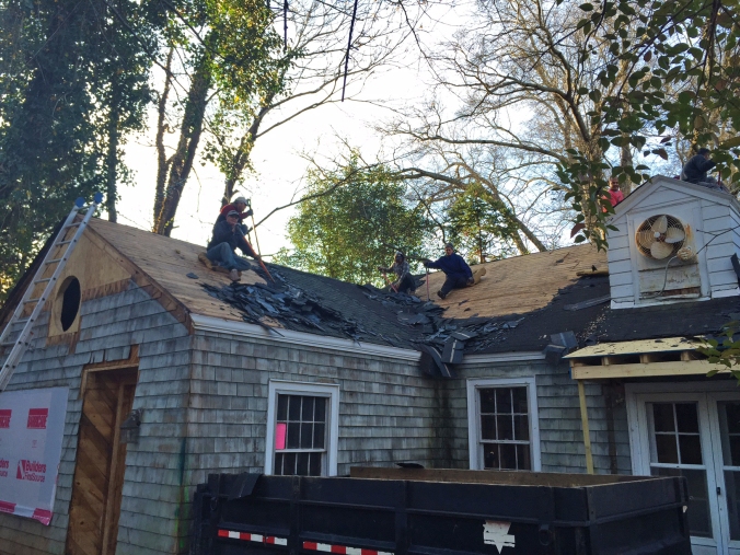 Scraping off three layers of old shingles!